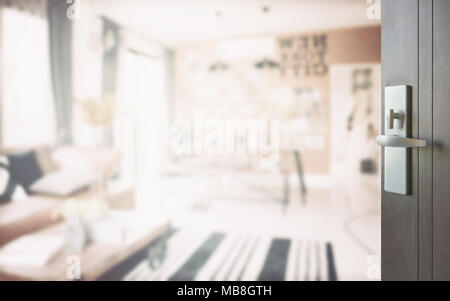 opened wooden door to modern living corner next to the dining room Stock Photo