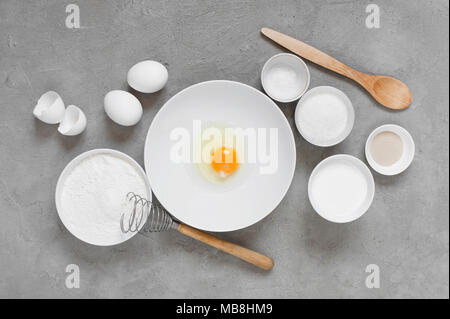 Ingredients for baking on the textured gray table. Top view Stock Photo