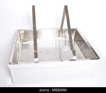 Plastic uncapping tub and sieve on white Stock Photo