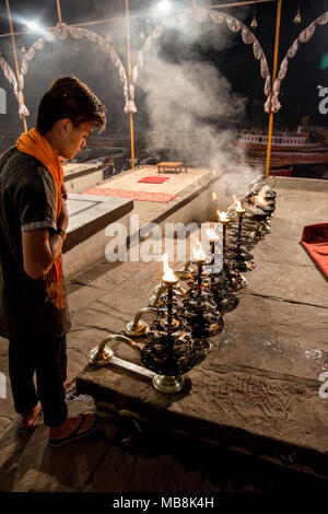 Men perform the nightly Hindu Puja Rituals in Varanasi, Uttar Pradesh, India Stock Photo