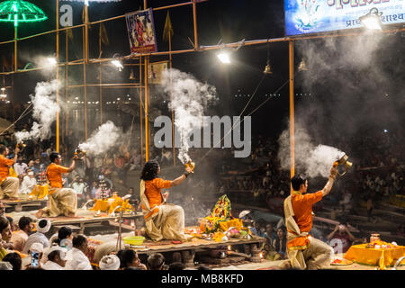 Men perform the nightly Hindu Puja Rituals in Varanasi, Uttar Pradesh, India Stock Photo