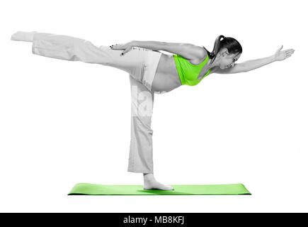Pregnant woman making exercise, isolated on white Stock Photo