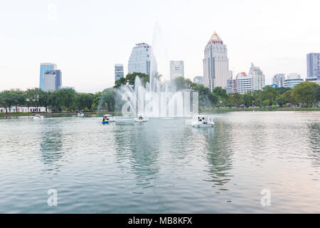 Bangkok Thailand: January 28, 2018:- People relax on a boat in a city park  in Lumpini Park Bangkok Thailand. Stock Photo