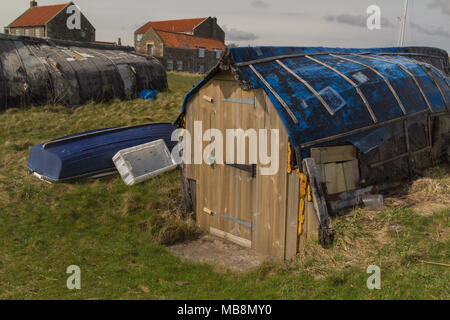 Boats & boat shed on Holy Island Stock Photo