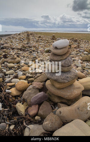 Stone stacks on Holy Island Stock Photo