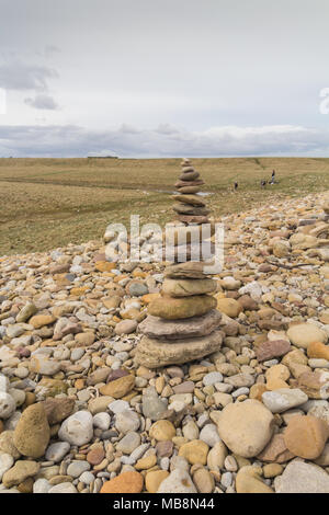 Stone stacks on Holy Island Stock Photo