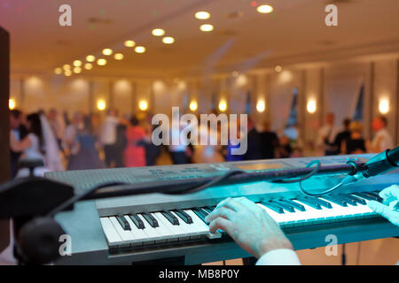 Dancing couples during party or wedding celebration Stock Photo