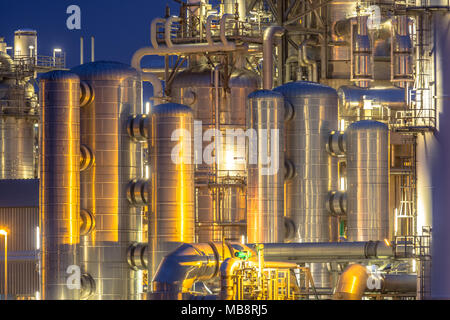 Chemical industry detail installation background at night. Petrochemical close up of factory. Stock Photo