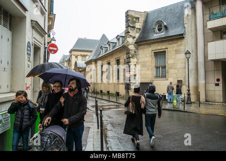 Walking in the streets of Paris in May. The light drizzle couldn't spoil the mood... Stock Photo
