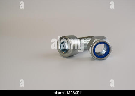 Hexagon Screws and nuts on white background Stock Photo