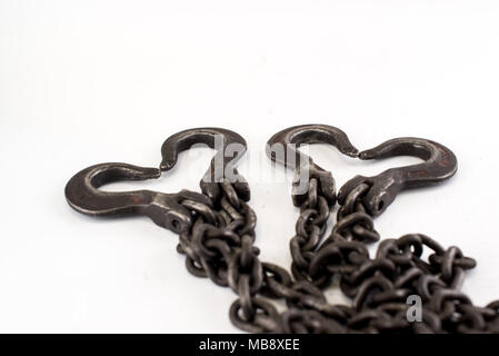 The old steel chains in form of heart on a white background Stock Photo