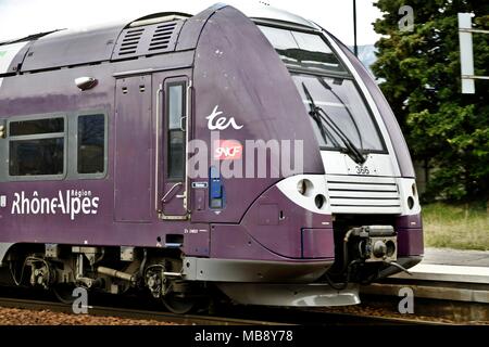 Waiting for the TER train along the dock, Grenoble SNCF station, Auvergne Rhone-Alpes region, and logo of the SNCF, National Railway Company. Grenoble Stock Photo