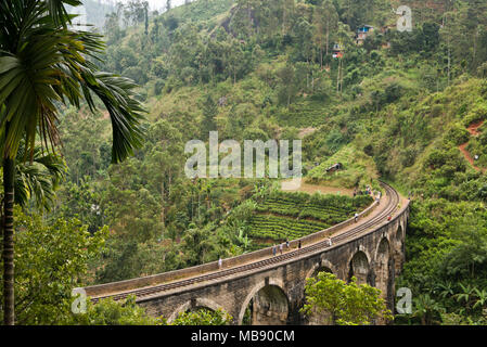 Horizontal view of people on the tracks at Nine Arches Bridge near Ella, Sri Lanka. Stock Photo