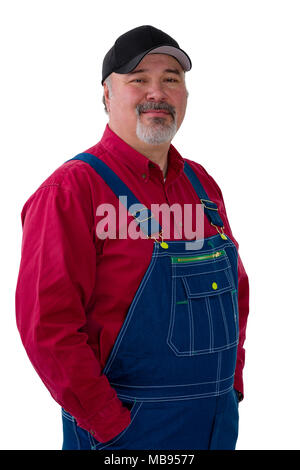 Portrait of cheerful man wearing dungarees standing against white background Stock Photo