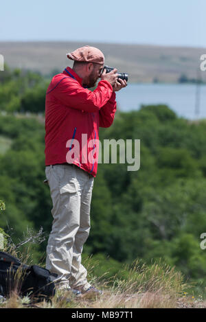 Male photographer at work Stock Photo