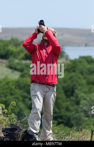 Male photographer at work Stock Photo