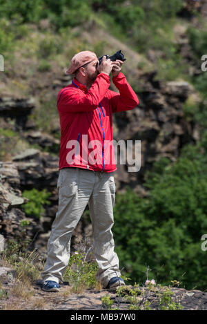 Male photographer at work Stock Photo