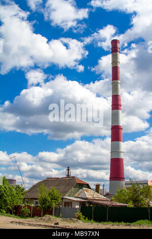 Pipe CHP against the sky in Ukraine. Stock Photo