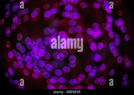 Bokeh background glowing oval shaped glow bright purple and red empty Stock Photo