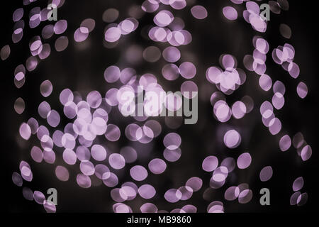 Bokeh background glowing oval shaped glow dark light purple empty Stock Photo