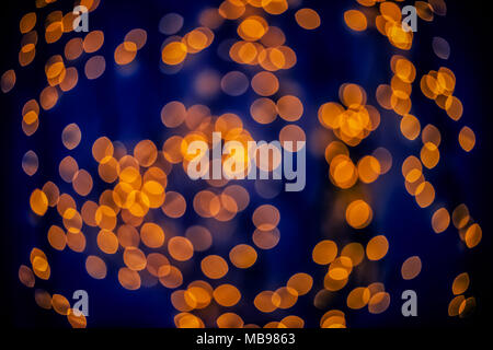 Bokeh background glowing oval shaped glow dark orange and dark blue empty Stock Photo