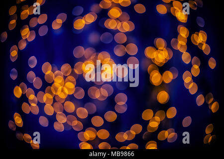 Bokeh background glowing oval shaped glow dark orange and dark blue empty Stock Photo