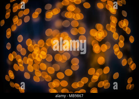 Bokeh background glowing oval shaped glow orange and black mixed empty Stock Photo