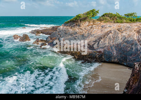 Toco Trinidad and Tobago West Indies rough sea beach cliff edge panorama. Stock Photo