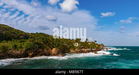 Toco Trinidad and Tobago West Indies rough sea beach cliff edge panorama. Scene, seacoast. Stock Photo