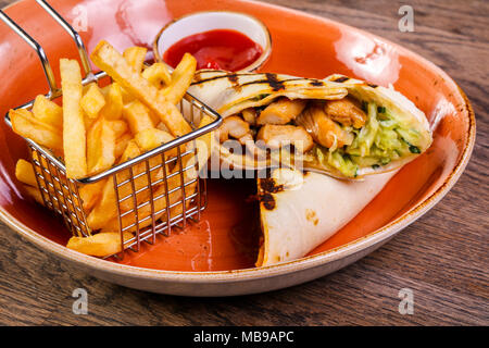 Pork Burrito with French potato Stock Photo