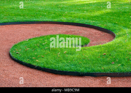 Decorative lawn in a park, abstract shape Stock Photo