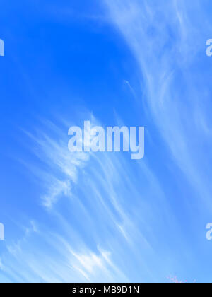 Sky and white clouds float in the sky with natural background and breeze on a bright day in the summer. Stock Photo