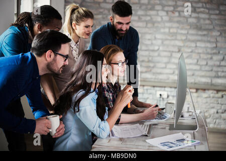 Young architects working on project in office Stock Photo