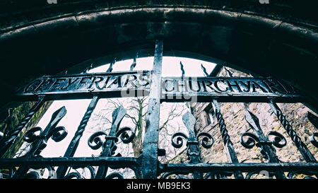 Detail of old gates at entrance to Greyfriars Churchyard ( Greyfriars kirkyard) in Old Town of Edinburgh, Scotland, United Kingdom Stock Photo