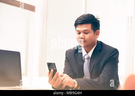 young business man using smart phone, business concept Stock Photo