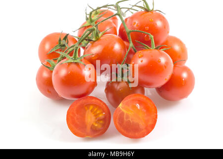 fresh red tomato isolated on white background, tomatoes whole and a half isolated on white with clipping path Stock Photo