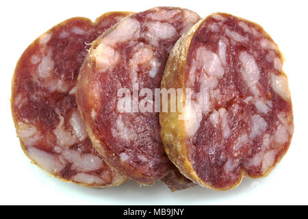 Top view macro detail of smoked salami slices, pepperoni slice, Italian prosciutto crudo ,raw ham texture isolated on white background , with clipping Stock Photo