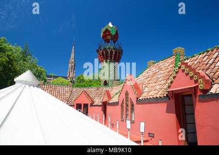 Comillas, Spain - July 3, 2017: Palace of El Capricho or Villa Quijano by the architect Gaudi in modernist style with tourists in the village of Comil Stock Photo