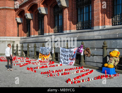 Germany Berlin, Mitte, 8th April 2018. Berlin Firefighters oppose austerity policies of state government in ‘Berlin Burns’ demonstration in Front of the Red Town Hall Firefighters are protesting about poor working conditions, lack of staff, old equipment and a recently introduced 12-hour shift system. A brazier carries their motto ’Berlin burns’ in a symbolic attempt to alert the public to the dangerous situation. The firefighters’ protest is directed against the Social Democratic-Left Party-Green Party coalition that runs the Berlin state government. credit: Eden Breitz/Alamy Live News Stock Photo