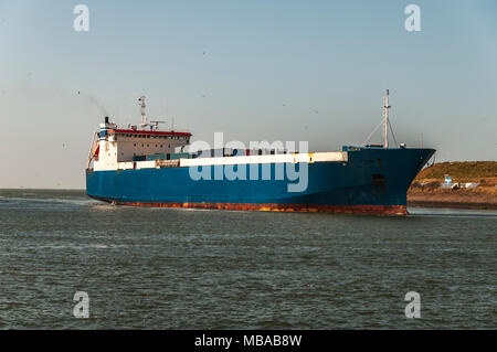 large sea cargo ship sails through the North Sea Canal Stock Photo