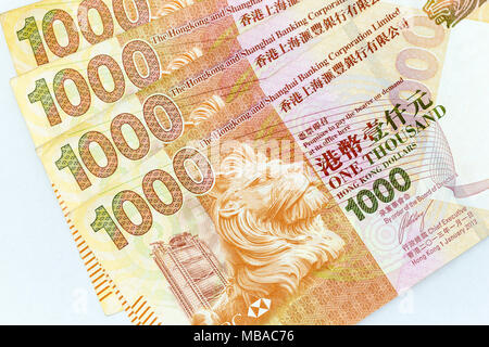 Currency banknotes spread across frame hong kong dollar in various denomination Stock Photo