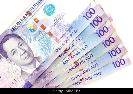 Currency banknotes spread across frame philippines peso in various denomination Stock Photo