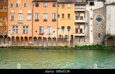 Ancient houses overlooking the Arno river in Florence, Italy Stock Photo