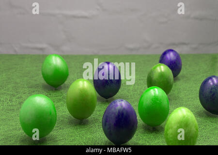 Stylish background of ombre blue Easter eggs isolated on white. Dyed Easter eggs Stock Photo