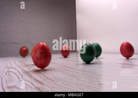 Stylish background of pale pink and gray Easter eggs. Dyed Easter eggs. Flat lay Stock Photo