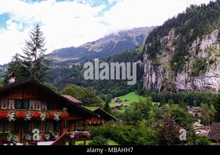 Swiss Alpine Tourist Town of Lauterbrunnen in Lauterbrunnen Valley, Jungfrau Region, Canton of Bern, Switzerland. View from the South. Stock Photo