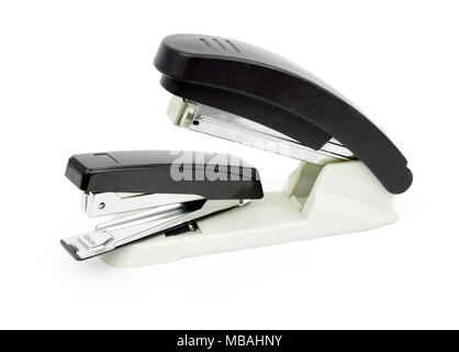 Two staplers. The concept of aggression Stock Photo