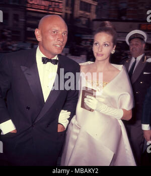 Film actor Yul Brynner with his wife of two months, 25-year-old