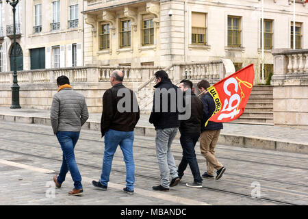 Trades Unionists public sector protestors heading home after taking in part protest march against President Macron's reforms in Orleans, France. 22nd  Stock Photo