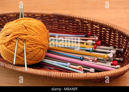 Knitting Needles in a Basket Stock Photo